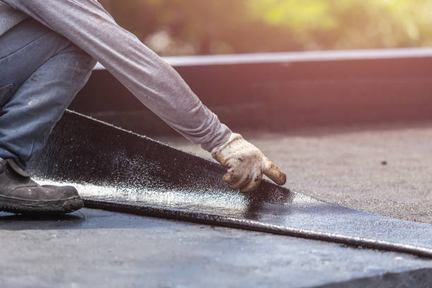 Professional Basement Waterproofing technician working in Forest City, PA